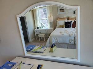 lot 133 image: Beveled Wall Mirror with White Frame by Liberty Furniture