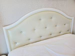 lot 142 image: Full Size Cream Faux Leather Headboard