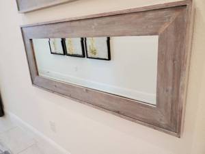 lot 36 image: Wood Framed Beveled Wall Mirror by StyleCraft