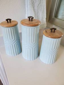 lot 127 image: Three Tia Aqua Ceramic Canisters by IMAX