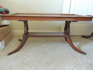 lot 8 image: Vintage Federal style coffee table with lyre supports, glass top, cabriole reeded legs and brass paw and toenail fittings. 36x18x17. Great condition