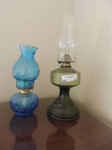 lot 22 image: Blue glass oil lamp 12 and green oil lamp 18