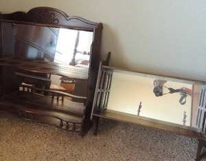 lot 24 image: 2 tier Curio wall shelf with mirror 21x22x6. 2 tier display shelf with mirror 16 x 18 x 5