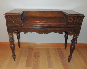 lot 30 image: Antique Desk with multiple storage compartments and original teardrop pulls. BEAUTIFUL  back right leg needs repair 33x42x19