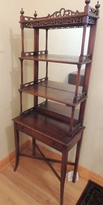 lot 31 image: Vintage mirror back etagere with pierced sides and gallery top and finials.Single drawer base with 3 shelves 59x22x12