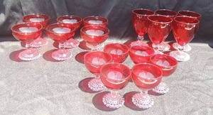 lot 36 image: Set of vintage ruby red clear stem bubble foot Glasses- 3 large, 6 medium, 6 small