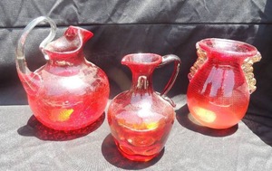 lot 38 image: Red and gold blown glass vase (possibly Italian Sommerso Murano), red handled pitcher and red handle blown glass vase