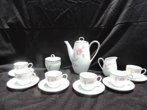 lot 40 image: Beautiful Noritake Pink Rose China tea set- 6 cups ,  6  plates, teapot, sugar and creamer. Rosemarie pattern 6044