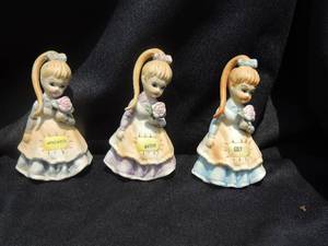 lot 46 image: Ponytail Girl figurines March,  July and November  QTY 3