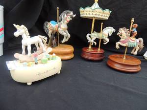 lot 54 image: 3 Carousel music Box collection and 1 Enesco Whistle a Happy Tune  Wooden Horse music box 10x8