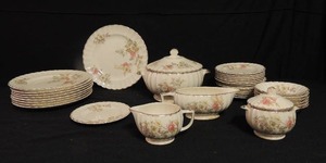 lot 66 image: Limoges 22K gold china floral design- Sugar & creamer, gravy boat, 6 small soup bowls, 1 covered soup tureen, 9 dinner plates 14 bread plates