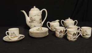 lot 71 image: Hand painted Kutone Tea set- Gold and glass    Tea pot, 6 saucers, 5 tea cups, sugar bowl and creamer,  14 PCS