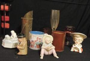 lot 108 image: Vintage Rubens Lady Head Vase #495, Coal Scuttle, Assorted household dcor items- candle stand, seagle music box, porcelain knick-knacks
