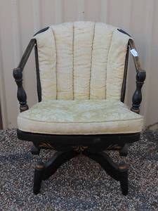 lot 125 image: Antique Cream color rocker with striped cushions, ebonized wgold accents