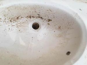 lot 144 image: White Bathroom Sink 19x31  Could use a cleaning