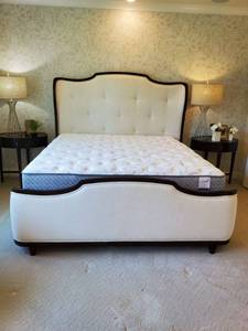 lot 11 image: King Size Bed with Dark Wood & Textured Cream Fabric