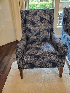 lot 44 image: Navy Accent Chair with Throw Pillow by Robin Bruce