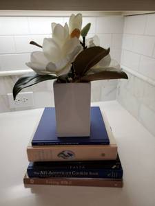 lot 115 image: Cookbooks & Faux Flowers