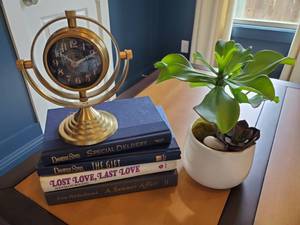 lot 159 image: Clock with Faux Succulent & Books