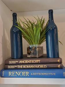 lot 174 image: 2 Blue Bottles with Faux Succulent by NDI & 3 Books