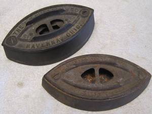 lot 957 image: 2 bases for antique sad irons