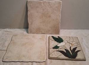 lot 1048 image: 2 pieces of tile and a stepping stone