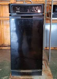 lot 1061 image: Kenmore Trash compactor