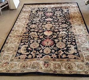 lot 1081 image: Navy and ivory rug