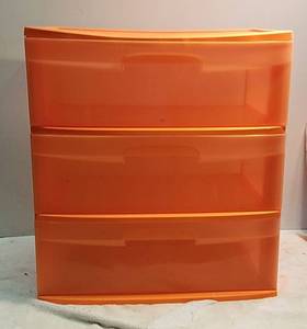 lot 1084 image: Orange plastic drawer set