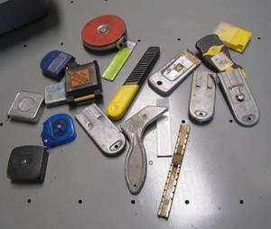 lot 1233 image: tape measures and scrapers