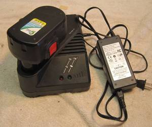 lot 1256 image: Bosch Up Start Battery and Charger
