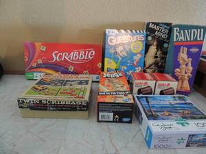 lot 70 image: Bandu, Jenga,Tri dominoes, twin cribbage and 1000 piece puzzle