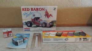 lot 72 image: Red Barron model Monogram NIB signed by Tom  Daniel   Tegtora model paints NIB, 8 paints in box,  paint thinner,  new brushes,  model cement  NEW