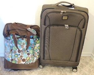 lot 73 image: Dockers suitcase 24     rolling carry bag