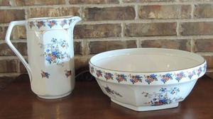 lot 9 image: Washbowl and Pitcher marked on bottom REQ NO 732974. Bowl 15x6 and pitcher 11H - WHITE WITH BLUE RED FLOWERS