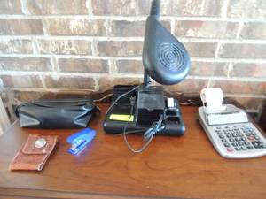 lot 19 image: Desktop penpencil caddy, lamp, Conor P-23-DH-V calculator recorder with paper roll, mini blue stapler and leather American west phone case