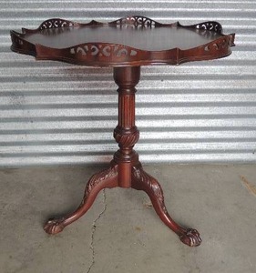 lot 127 image: Mahogany Pie Crust side table with tri leg cabriole base, paw feet and pierced gallery edge, Model 1118   30x27