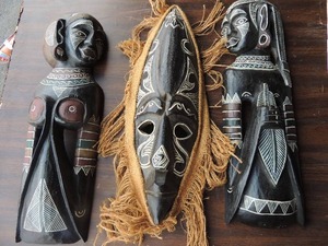 lot 131 image: CARVED BALINESE WOMEN X 2 & TRIBAL MASK X 1  - all are 19H