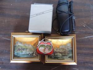 lot 138 image: 2 Gold photo frames Sungott Art Studios NY  Coin purse design frame 3x2  2 bullet line calculators, black landline phone