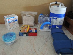 lot 157 image: Cryo cooler, surgical bandages, ace bandages, nausea bags and more