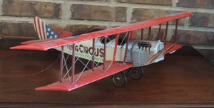 lot 56 image: Flying Circus Biplane Red and White Wood 28w x 18L