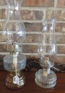 lot 163 image: VINTAGE GLASS OIL LAMPS WITH CHIMNEY  - ONE HAS A METAL BASE  16 HT,  ONE HAS EMBOSSED BASE  14