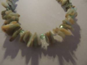 lot 181 image: Pale green stone with green glass beads NECKLACE