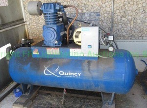 lot 1 image: Quincy QT-5 air compressor. (Buyer will need to disconnect from air lines prior to removal)