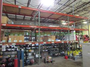 lot 59 image: Pallet rack three sections, 24ft. Contents not included