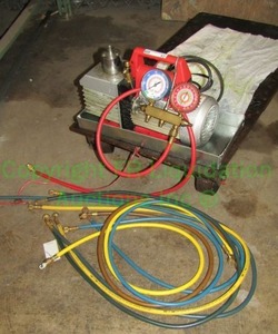 lot 62 image: Robinair VacuMaster Refrigerant recover system and flat cart plus as shown