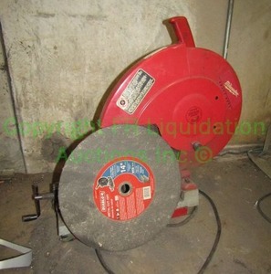 lot 97 image: Milwaukee 14 abrasive cutoff machine model 6176-20, plus extra grinding wheels