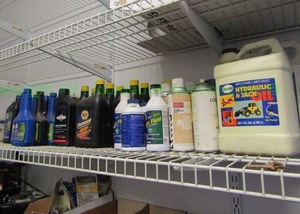 lot 299 image: NAPA and other brands automotive fluids including small engine oil, ATF and more as shown