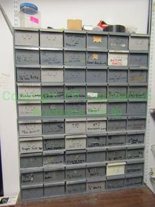 lot 289 image: Parts drawer unit plus contents of misc. parts and hardware