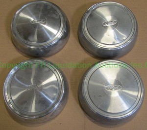 lot 285 image: Ford E-150, E-250, E-350 OEM Stainless Steel Dogdish Center Cap